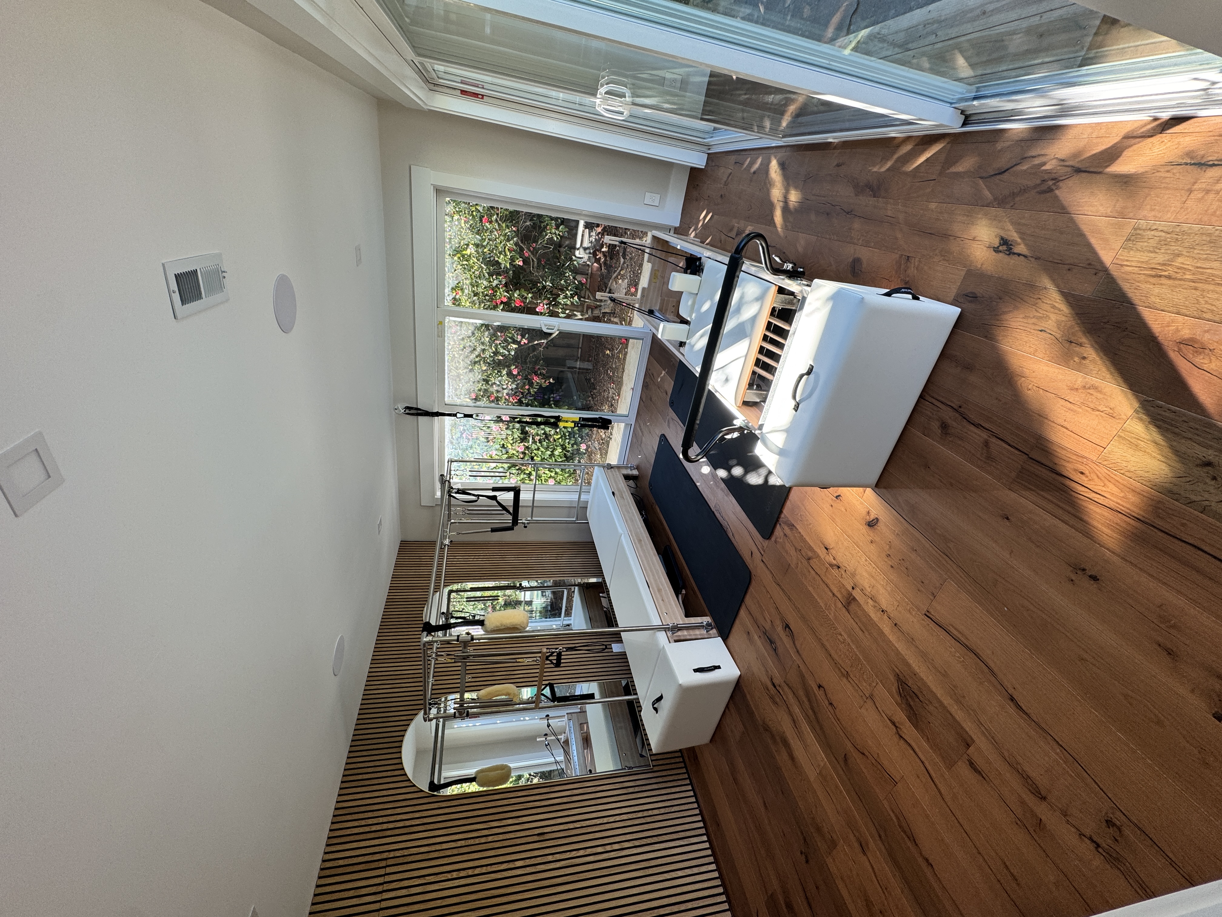Blossom Pilates Studio — reformer and equipment with natural light